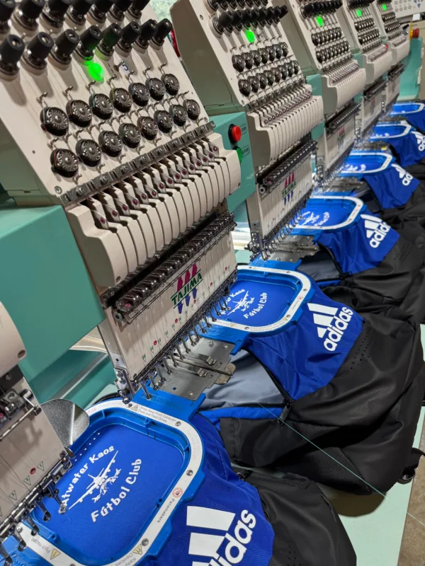 Team apparel personalization on our commercial embroidery machines in Merced, CA