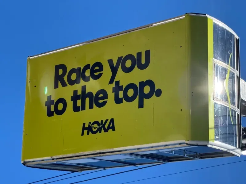 HOKA promotional banner and large-format signage by InsideLines GRAPHIX in Merced, CA
